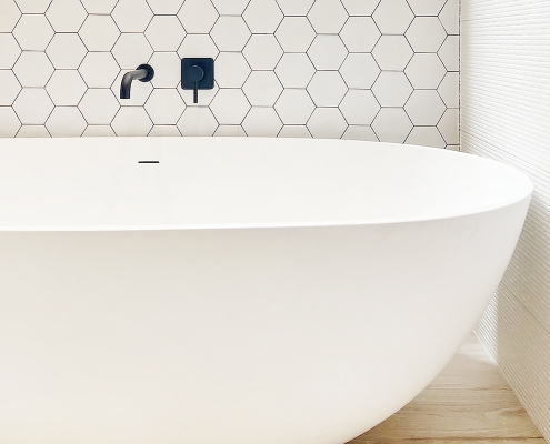 Modern Master Bathroom with Honeycomb Tiles in Victory Heights Dubai by The Big Fitout
